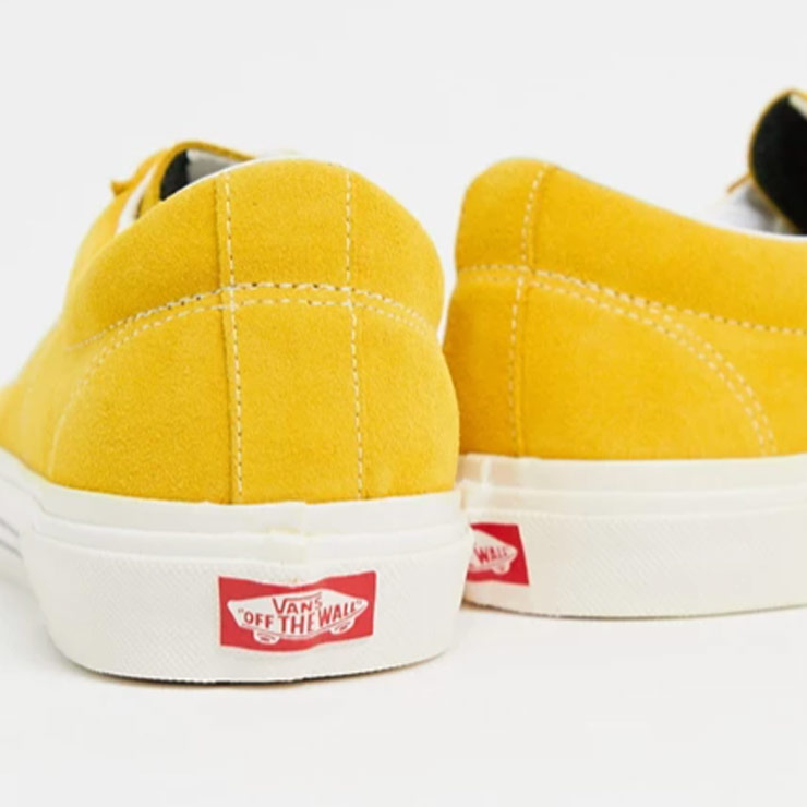 UA Sid DX trainers in og yellow, $103 USD