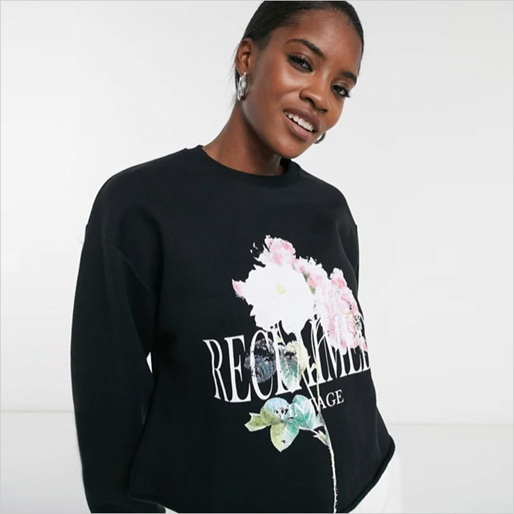 Inspired crop sweat with logo bloom print in black, $47.37 USD