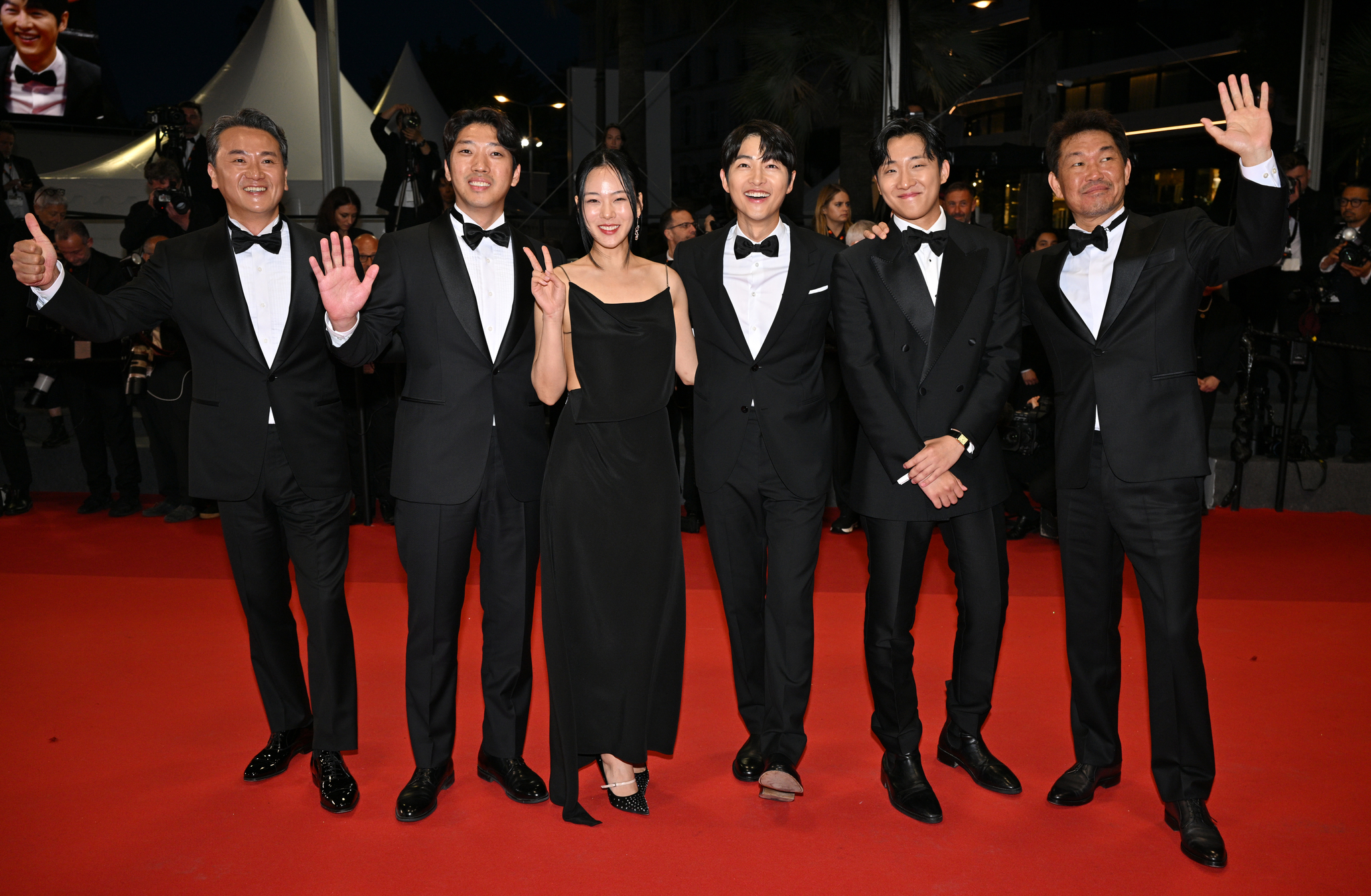 CANNES, FRANCE - MAY 24: Joong Ki Song, Kim Chang-Hoon, Hyoung Seo Kim and Xa Bin Hong attend the ″Il Sol Dell'Avvenire (A Brighter Tomorrow)″ red carpet during the 76th annual Cannes film festival at Palais des Festivals on May 24, 2023 in Cannes, France. (Photo by Lionel Hahn/Getty Images)